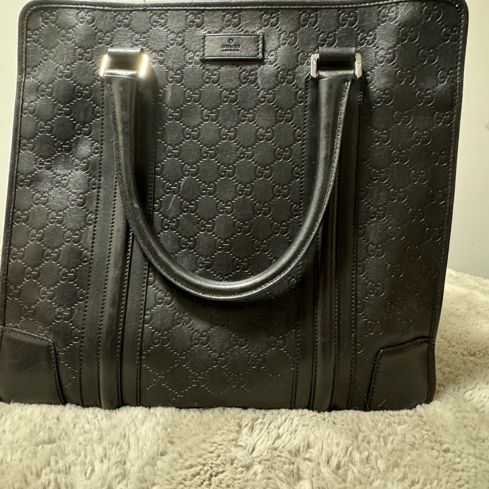 Gucci leather tote bag embossed logo